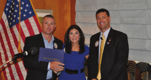 Francesca Gilbert presents Paul Harris to Chris Bennett.