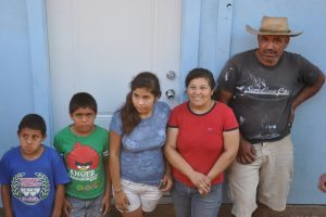 carmen-carlos-and-kids-receive-house-keys