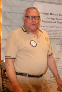 Ted McAdam sings Happy Birthday to his fellow club members.