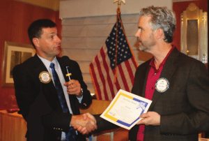 President Dave presents a Sole Power Award to our member speaker Jim Kohl.