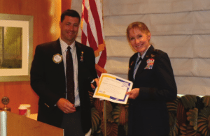 President Dave presents our speaker Brigadier General Jeannie M. Leavitt the commander of the 57th Wing at Nellis AFB.