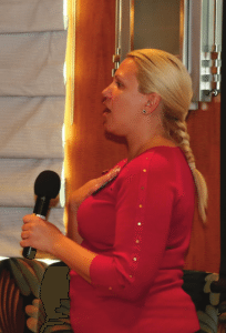 Jaimee Goldsmith led us in song.