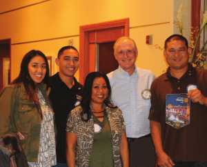 Sargent-at-Arms Tom Axtell presented a flag to our visitors from Hawaii.