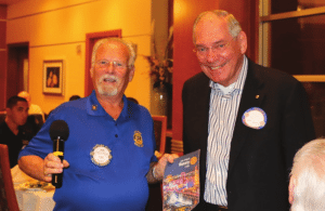 Bob Werner presents our foreign visitor from Germany with our Banner.