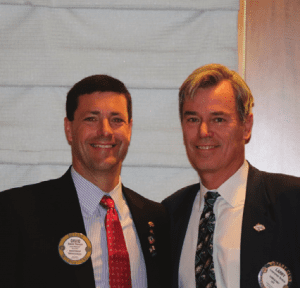 Larry Tomsic is awarded with a Four Way Test Coin from President Dave.