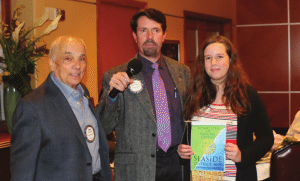 Sargent-At-Arms John Ingeme recognizes Bill Houghton’s daughter Peyton who did a Rotary makeup in Playa Del Carmen.