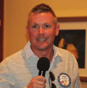 President Dave notices that Chris Bennett was not sitting at the birthday table.