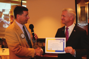 President Dave presents our speaker Steven Seroka “The Colonel” with our Sole Power Award.