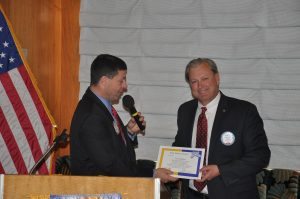 Dave Thorson presents Scott Hunter with Sole Power award