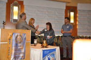 Jim Kohl gives check to Candlelighters