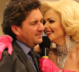 Matt Nelson enjoys his Birthday song from Marilyn capped off with a kiss.