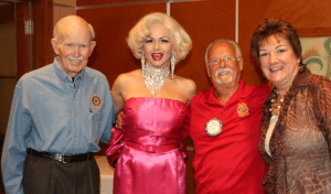 Our greeter Jennifer Lier, aka Marilyn Monroe poses with Jim Jones, Bob Werner and Deb Granda.