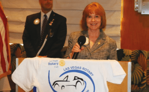 Arleen Sirois opens the meeting with an invocation