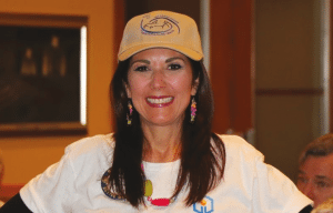 Francesca Gilbert models the Car Show tee shirts that are for sale.