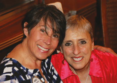 Nancy Slitz is moving to Colorado and poses with Janet Linder for a going away photo.