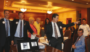 President Dave poses with the birthday table members.