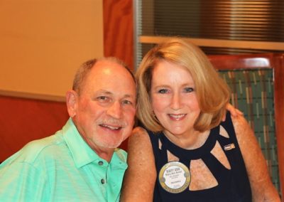 Past president Mary Ann poses with her husband Steve.
