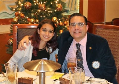 Anil Melnick enjoys lunch in the company of his daughter Mia.