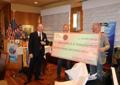 PP’s Jim Hunt, Randy Donald and Tom Krob held up the check to JC Penney for our Santa Clothes Shopping for kids program.