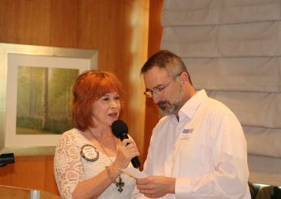 Arleen Sirois and her husband Michael sang "You are my Sunshine" with the men and women each singing different lines