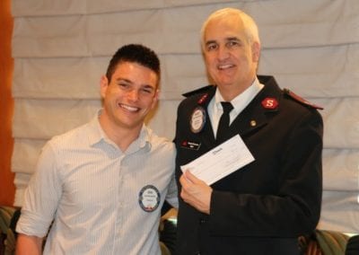 Erik Astramecki presented a check to the Salvation Army for $7,656.60 for the canned food drive. Great job Erik.