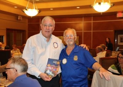 Robert Werner presented our visiting International Rotarian with our banner.