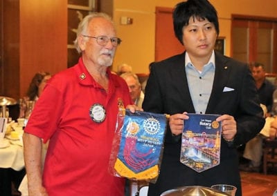 Bob Werner exchanged banners with a visitor from Japan.