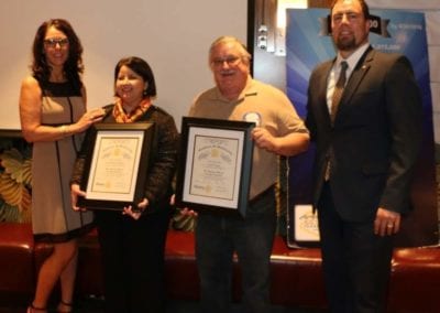 Rosalee Hedrick inducted two new members Ana Orellana and Bruce Frazey.