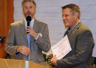 President Jim presents our speaker Braden Schrag of the Metro RECAP Progream with our “Share What You Can” award.