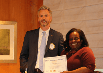President Jim presented our speaker Kathi Thomas-Gibson of the Courtyard Homeless Resource Center with our Share What You Can Award.