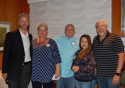 Janice Lencke recognized AE&ES owner Gary Bordman and Owner Walter Carnwright and Lani Lopez of AGR for their support for our fundraiser Cuisine & Octane