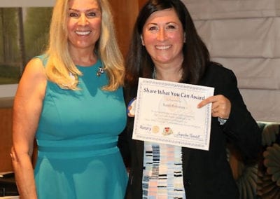 President Jackie presented our guest speaker Sarah Robinson from ShelterBox with our Share What You Can Award.