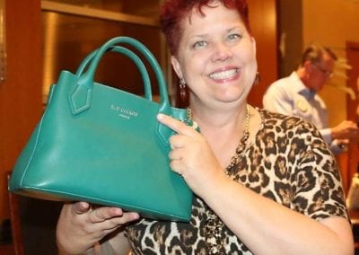 Janet Lencke showed off her Red Cuckoo purse from London. Who’s the Cuckoo the red head or the purse?