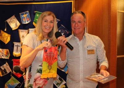 President Jackie exchanges banners with our new Member Mike Newborm formerly with the Rotary Club of San Diego.