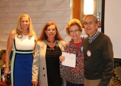President Jackie presented checks to our Superbowl winners, PP Karen Whisenhunt, Carolyn Sparks and Walt Parrish.