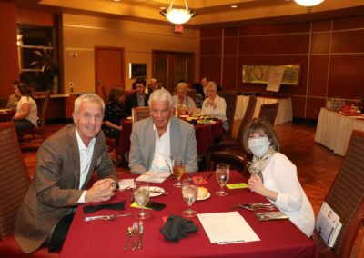 Head table guests Tom Thomas, speaker Jack Sheehan, and Toni Kern