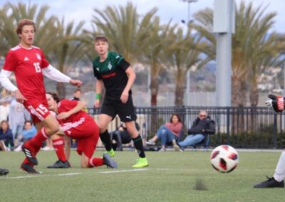 Players kicking a soccer ball at the Las Vegas Mayor's Cup