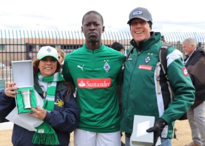 Santander player poses for photo with host family