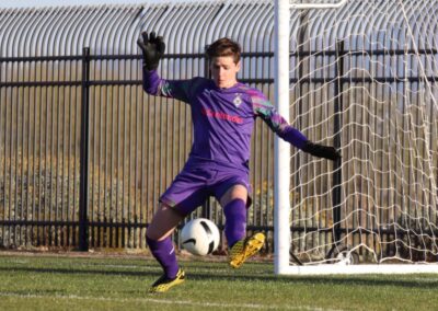 Player kicking a soccer ball at the Las Vegas Mayor's Cup