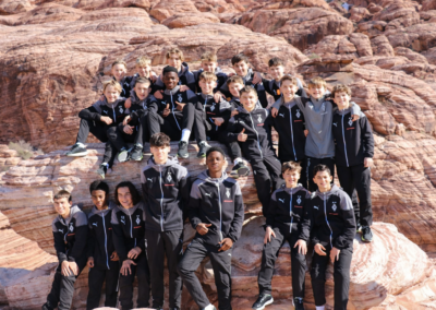 Las Vegas Mayor's Cup team poses for photo in front of Red Rock Canyon